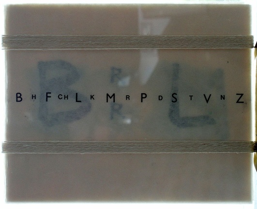 1979, 200×270 mm, grafit, netkaná textilie, tranzotyp, plexisklo, provázek, nesig. - líc